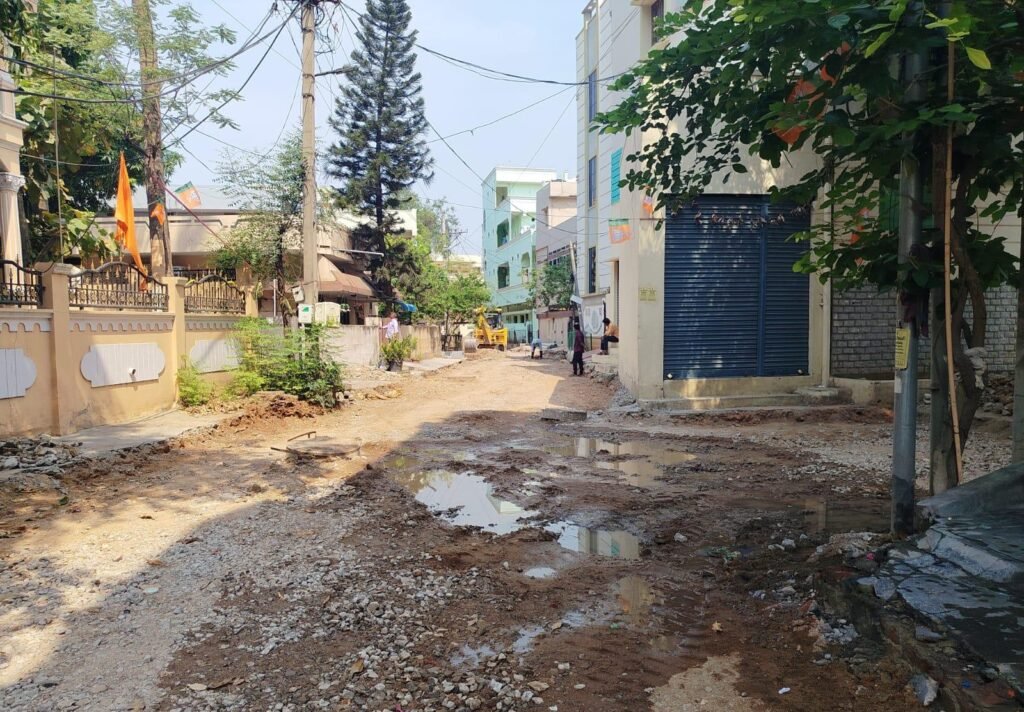 రోడ్డు పనుల పేరుతో ప్రజా ఆస్తుల ధ్వంసం…  బాధ్యత ఎవరిది?